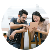 Two students looking at iPad