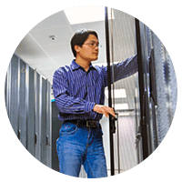 Close up of people collaborating on laptops