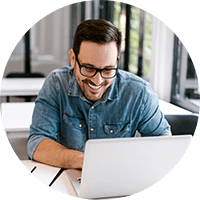 Man smiling while working