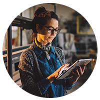 Woman working on tablet device