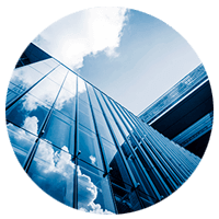 Clouds reflecting in modern business windows