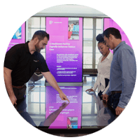 Playing with the touch screen display in the Insight Innovation Center