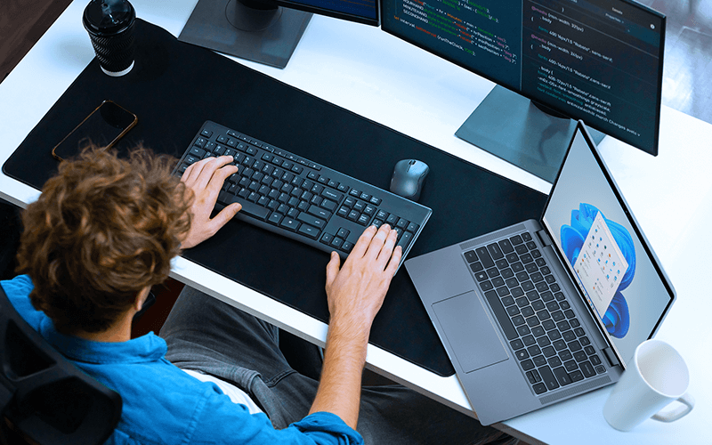 Man coding at the office