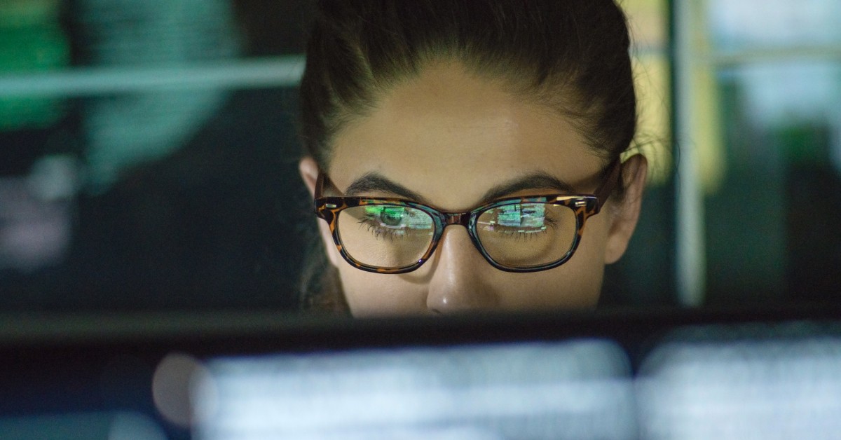 74% of employees agree that the ability to work remotely would make them less likely to leave their job Business professional sitting on floor in modern living room and working on laptop computer. Remote mobile work