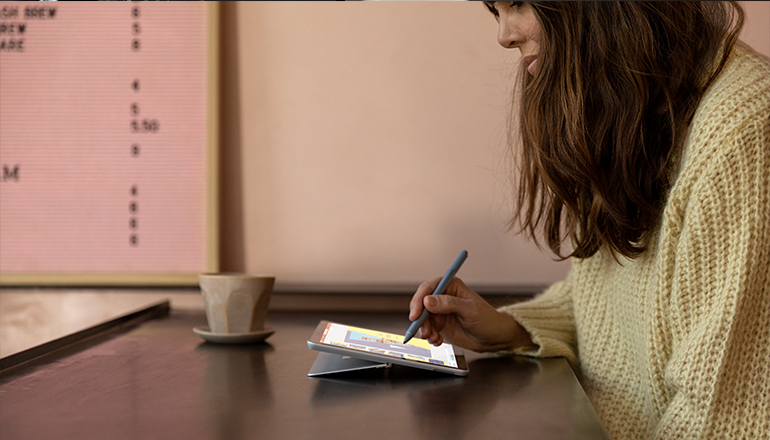 74% of employees agree that the ability to work remotely would make them less likely to leave their job Business professional sitting on floor in modern living room and working on laptop computer. Remote mobile work