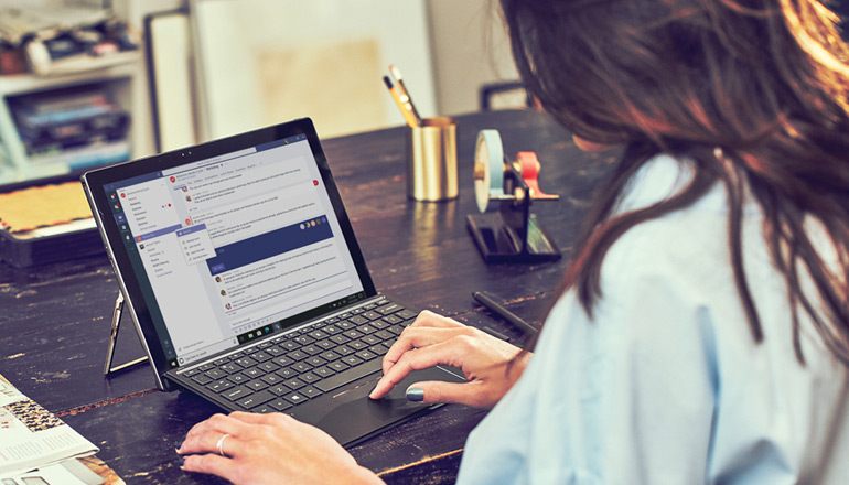 Business man speaking on phone outside