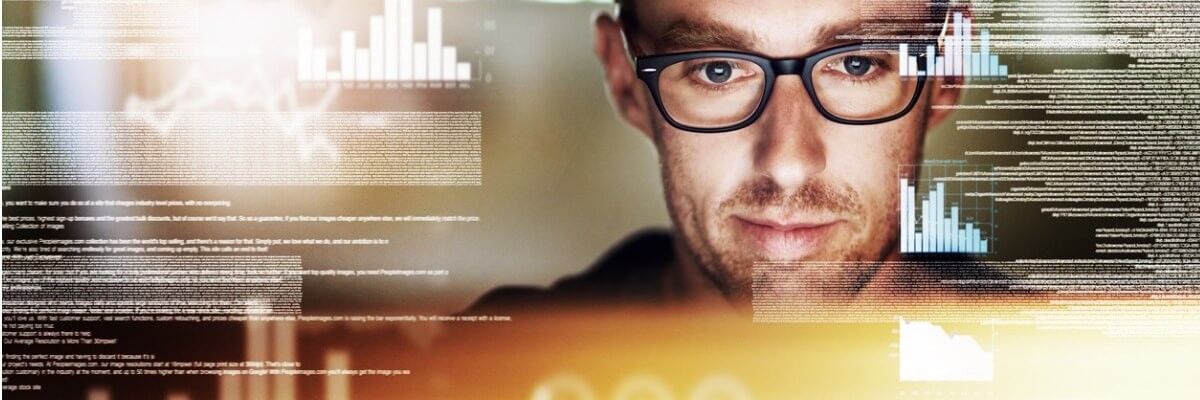 Management of devices and applications has become an important part of a companies investment strategy. Business professionals using laptops in a modern office meeting