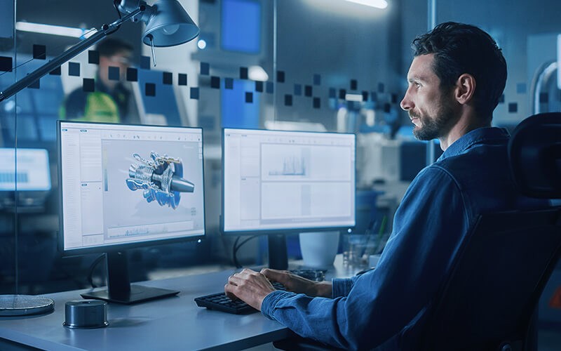 Man using dual monitor