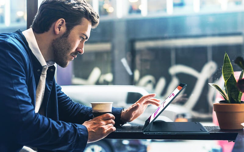 Man using a TravelMate laptop 