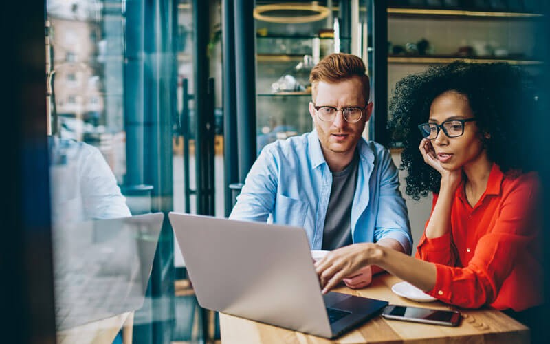 Adobe VIP for Creative Cloud® ensures apps are always up to date with the newest capabilities Two coworkers collaborating together