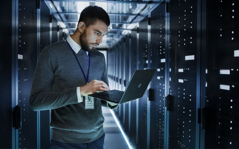 Employee working in data center