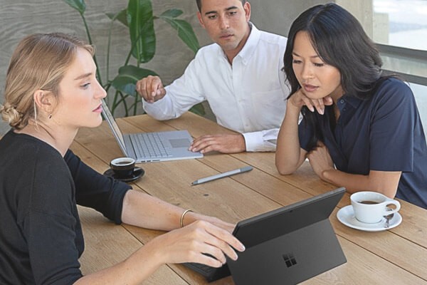 Female expert showing details with her client