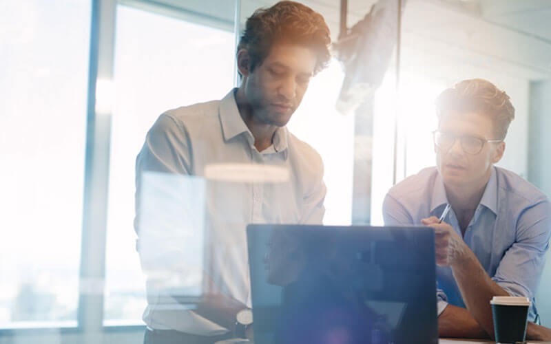 Two men collaborating