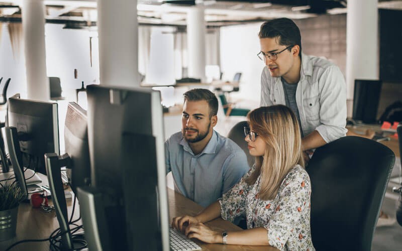 Team working on desktop space