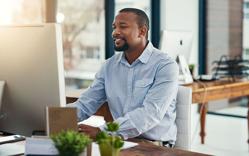 Know your clients better than ever with CRM. Business man working on workforce applications on desktop computer