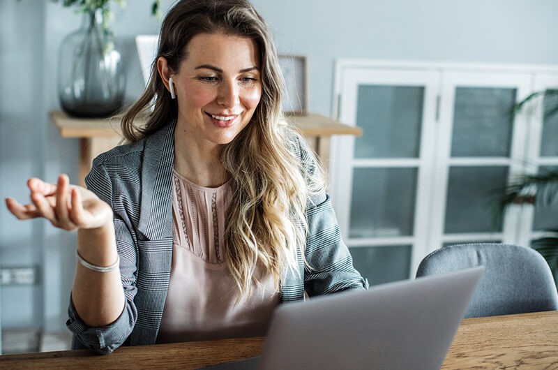 Business professional using automated workflows and self-service tools. 